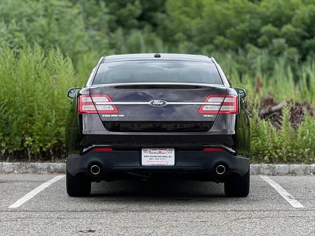 Photo of 2013 Kodiak Brown Metallic Ford Taurus