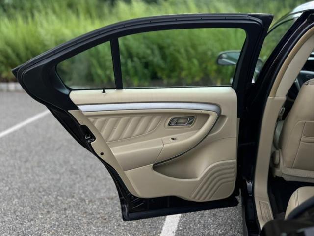 Photo of 2013 Kodiak Brown Metallic Ford Taurus
