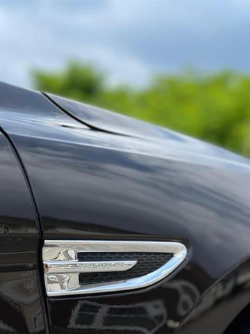 Photo of 2013 Kodiak Brown Metallic Ford Taurus