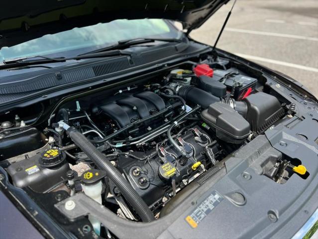 Photo of 2013 Kodiak Brown Metallic Ford Taurus