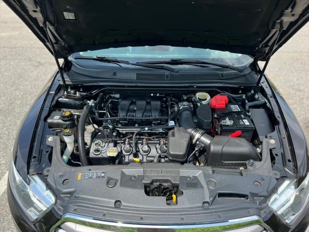 Photo of 2013 Kodiak Brown Metallic Ford Taurus