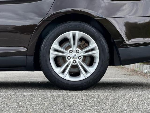 Photo of 2013 Kodiak Brown Metallic Ford Taurus