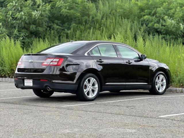 Photo of 2013 Kodiak Brown Metallic Ford Taurus