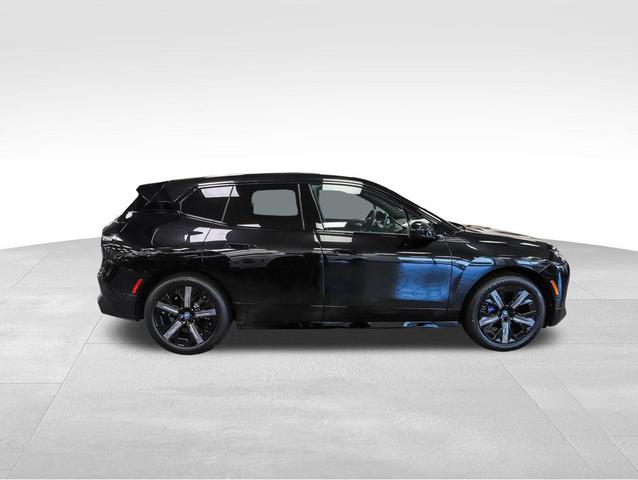 Photo of 2025 Black Sapphire Metallic BMW iX