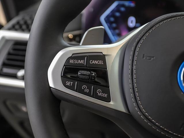 Photo of 2026 Black Sapphire Metallic BMW X5 PHEV
