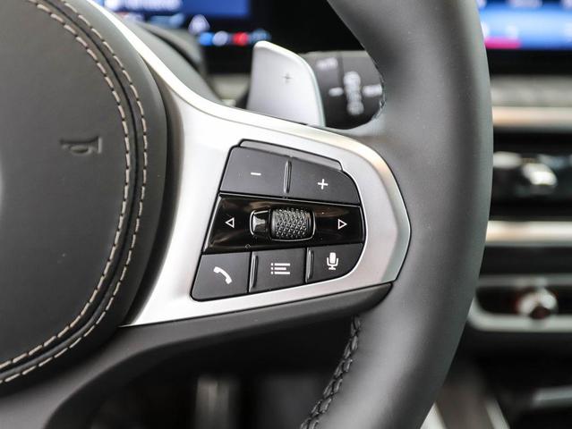 Photo of 2026 Mineral White Metallic BMW X5