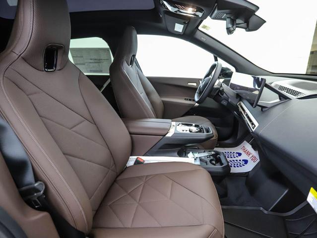 Photo of 2026 Black Sapphire Metallic BMW iX