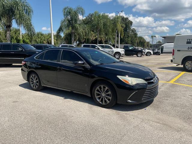 Photo of 2016 Midnight Black Metallic Toyota Camry