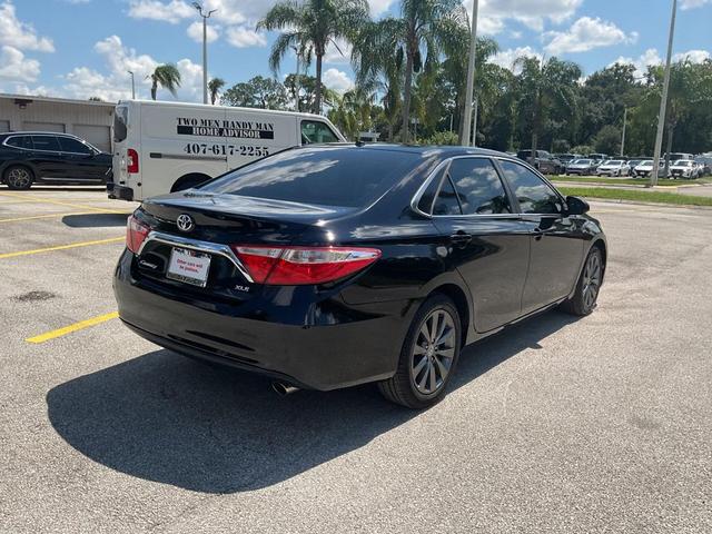 Photo of 2016 Midnight Black Metallic Toyota Camry