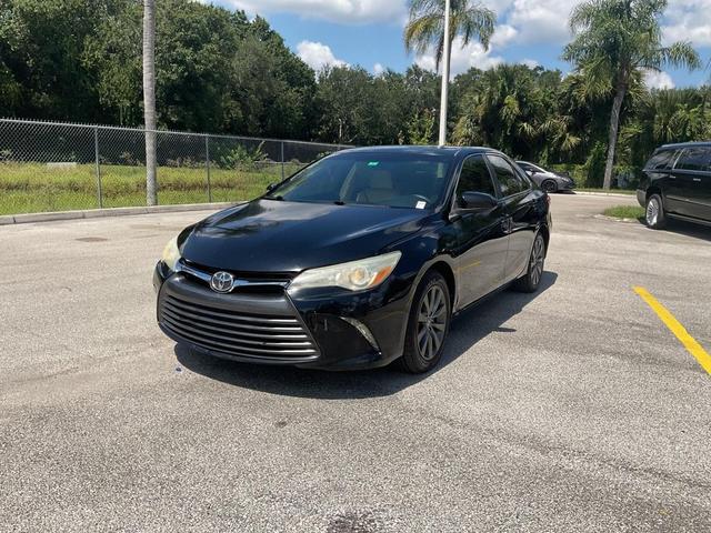Photo of 2016 Midnight Black Metallic Toyota Camry