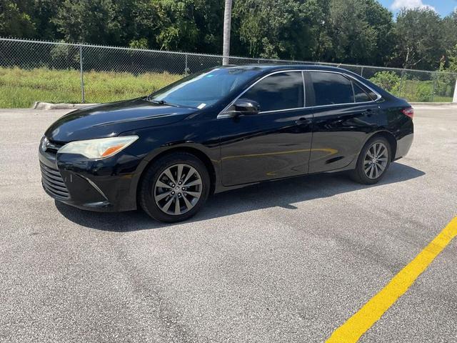 Photo of 2016 Midnight Black Metallic Toyota Camry