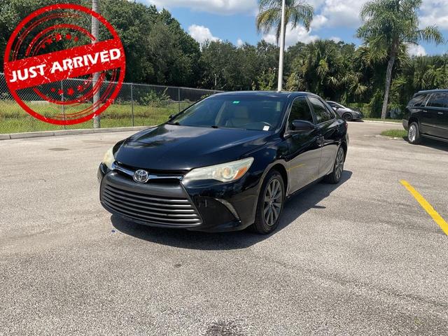 Photo of 2016 Midnight Black Metallic Toyota Camry