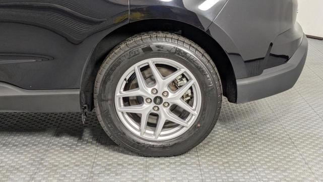 Photo of 2024 Agate Black Metallic Ford Edge