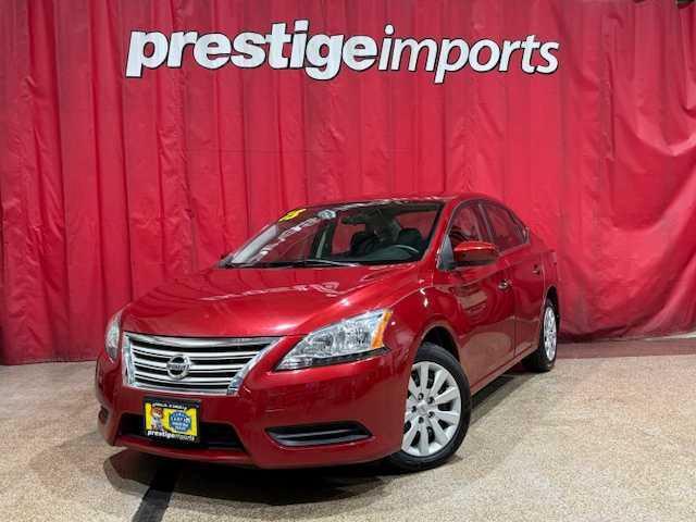 Photo of 2013 Red Brick Nissan Sentra