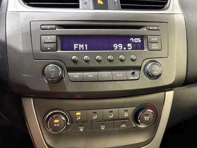 Photo of 2013 Red Brick Nissan Sentra