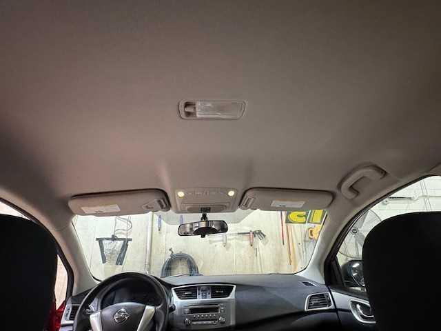 Photo of 2013 Red Brick Nissan Sentra
