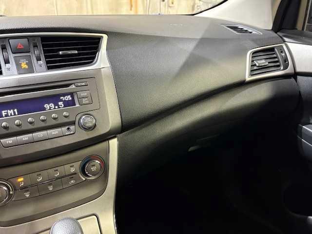 Photo of 2013 Red Brick Nissan Sentra