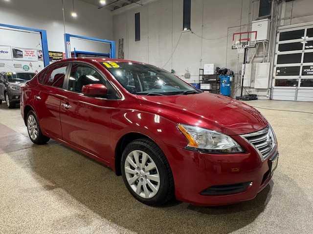 Photo of 2013 Red Brick Nissan Sentra