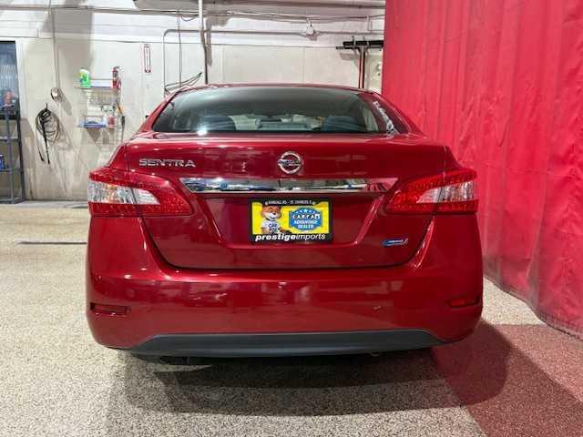 Photo of 2013 Red Brick Nissan Sentra