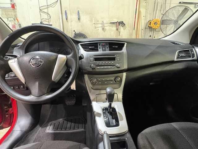 Photo of 2013 Red Brick Nissan Sentra