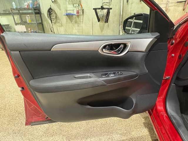 Photo of 2013 Red Brick Nissan Sentra