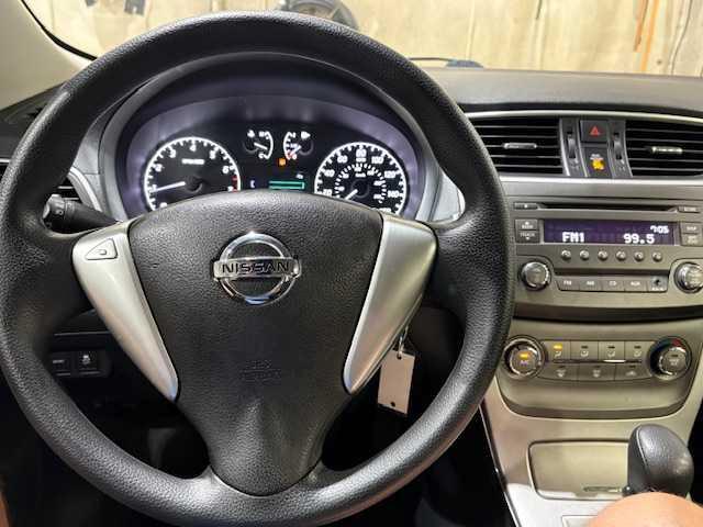 Photo of 2013 Red Brick Nissan Sentra
