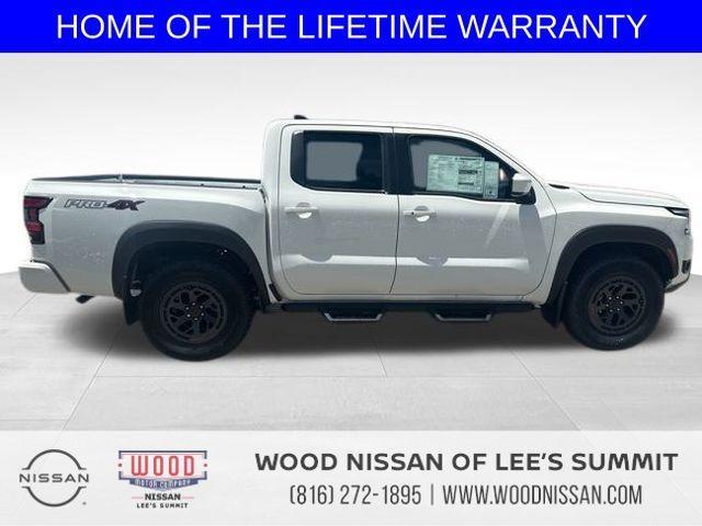 Photo of 2025 Glacier White Nissan Frontier