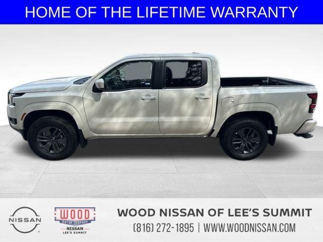 Photo of 2025 Glacier White Nissan Frontier