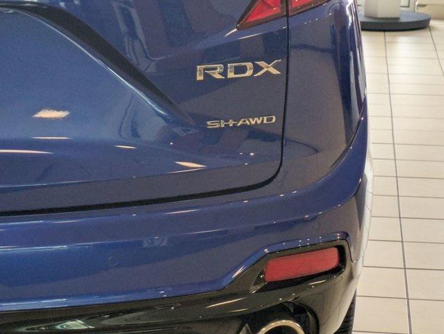 Photo of 2025 Apex Blue Pearl Acura RDX