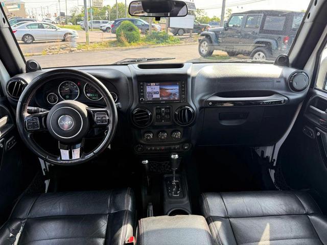 Photo of 2012 Bright White Clearcoat Jeep Wrangler Unlimited
