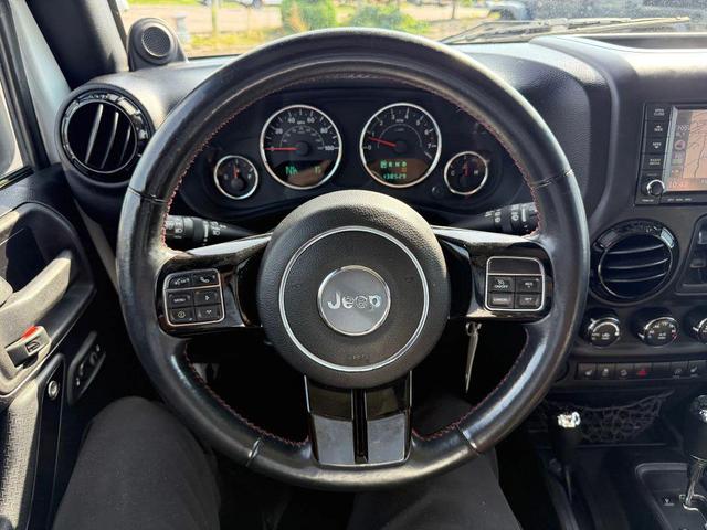 Photo of 2012 Bright White Clearcoat Jeep Wrangler Unlimited