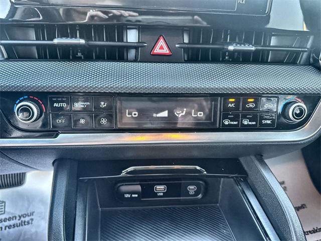 Photo of 2023 Steel Gray Kia Sportage Hybrid