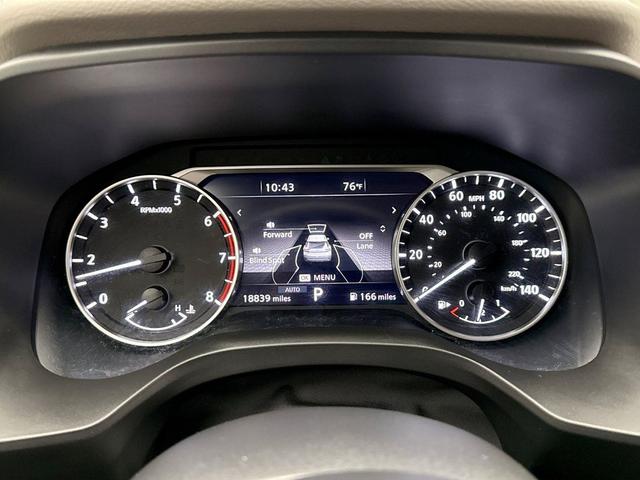Photo of 2023 Pearl White Tricoat Nissan Rogue