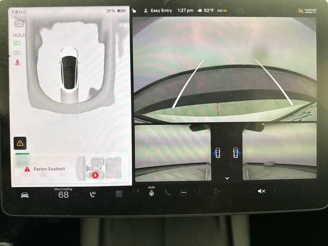 Photo of 2022 Pearl White Tesla Model 3