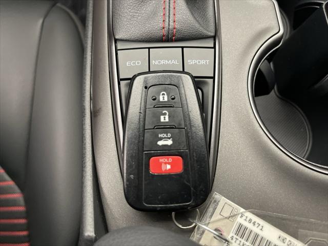 Photo of 2023 Wind Chill Pearl/Midnight Black Metallic Toyota Camry