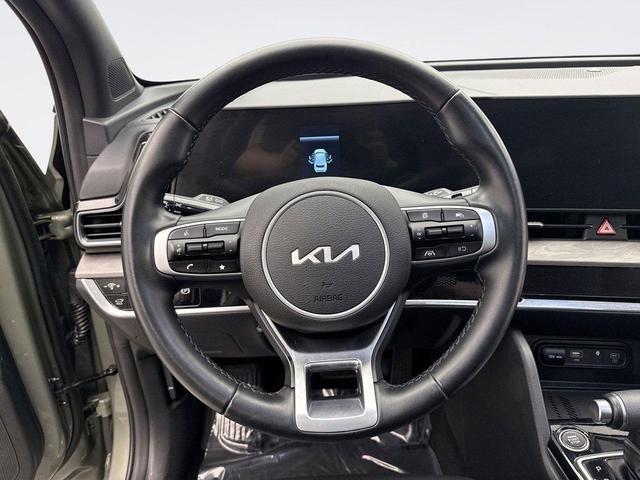 Photo of 2024 Jungle Green Kia Sportage