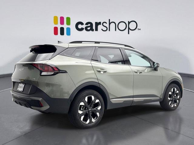 Photo of 2024 Jungle Green Kia Sportage