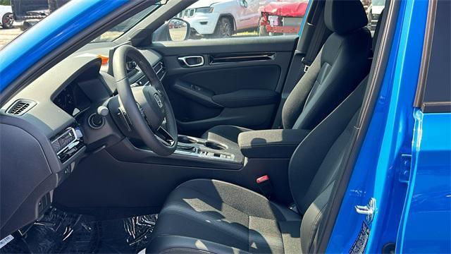 Photo of 2025 Boost Blue Pearl Honda Civic Hybrid