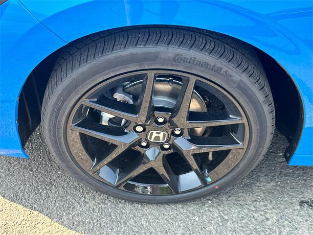 Photo of 2025 Boost Blue Pearl Honda Civic Hybrid