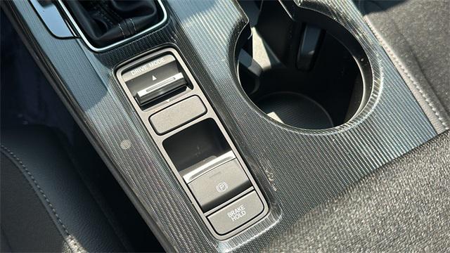 Photo of 2025 Boost Blue Pearl Honda Civic Hybrid
