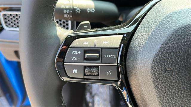 Photo of 2025 Boost Blue Pearl Honda Civic Hybrid