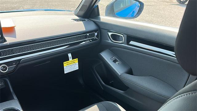 Photo of 2025 Boost Blue Pearl Honda Civic Hybrid