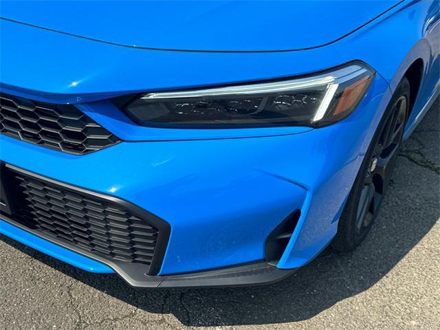Photo of 2025 Boost Blue Pearl Honda Civic Hybrid