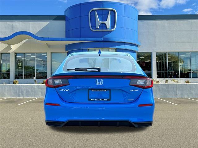 Photo of 2025 Boost Blue Pearl Honda Civic Hybrid