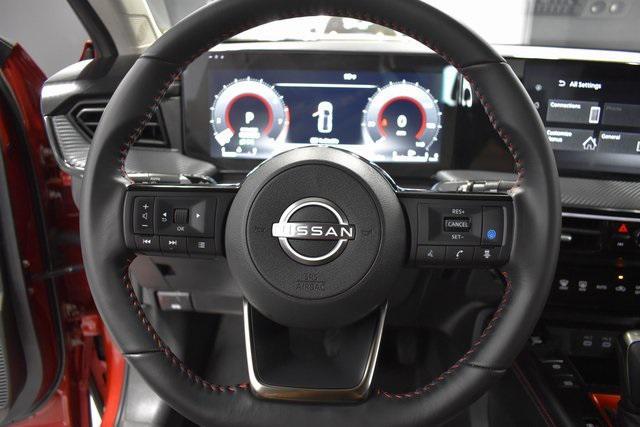 Photo of 2025 Scarlet Ember Tintcoat Nissan Kicks