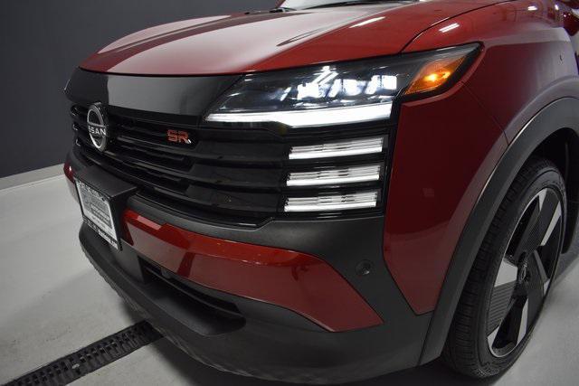 Photo of 2025 Scarlet Ember Tintcoat Nissan Kicks