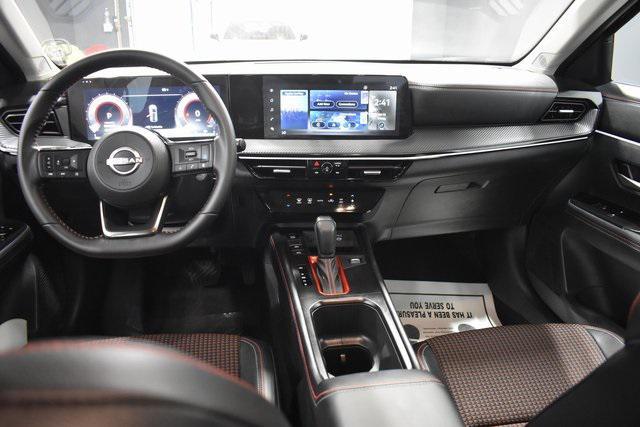 Photo of 2025 Scarlet Ember Tintcoat Nissan Kicks