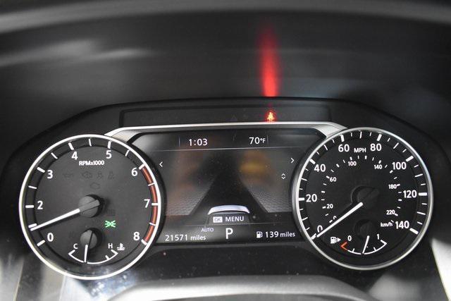 Photo of 2023 Pearl White Tricoat Nissan Rogue