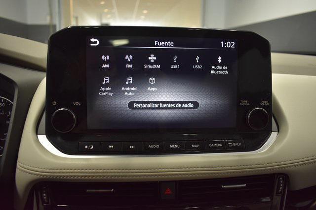 Photo of 2023 Pearl White Tricoat Nissan Rogue