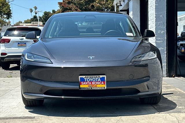 Photo of 2025 Stealth Grey Tesla Model 3